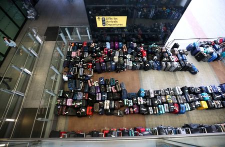 Luggage piles join long airport lines in fresh woes for summer travel