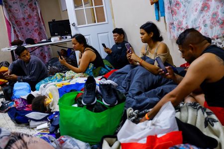 Struggling with US asylum app, migrant families split at border